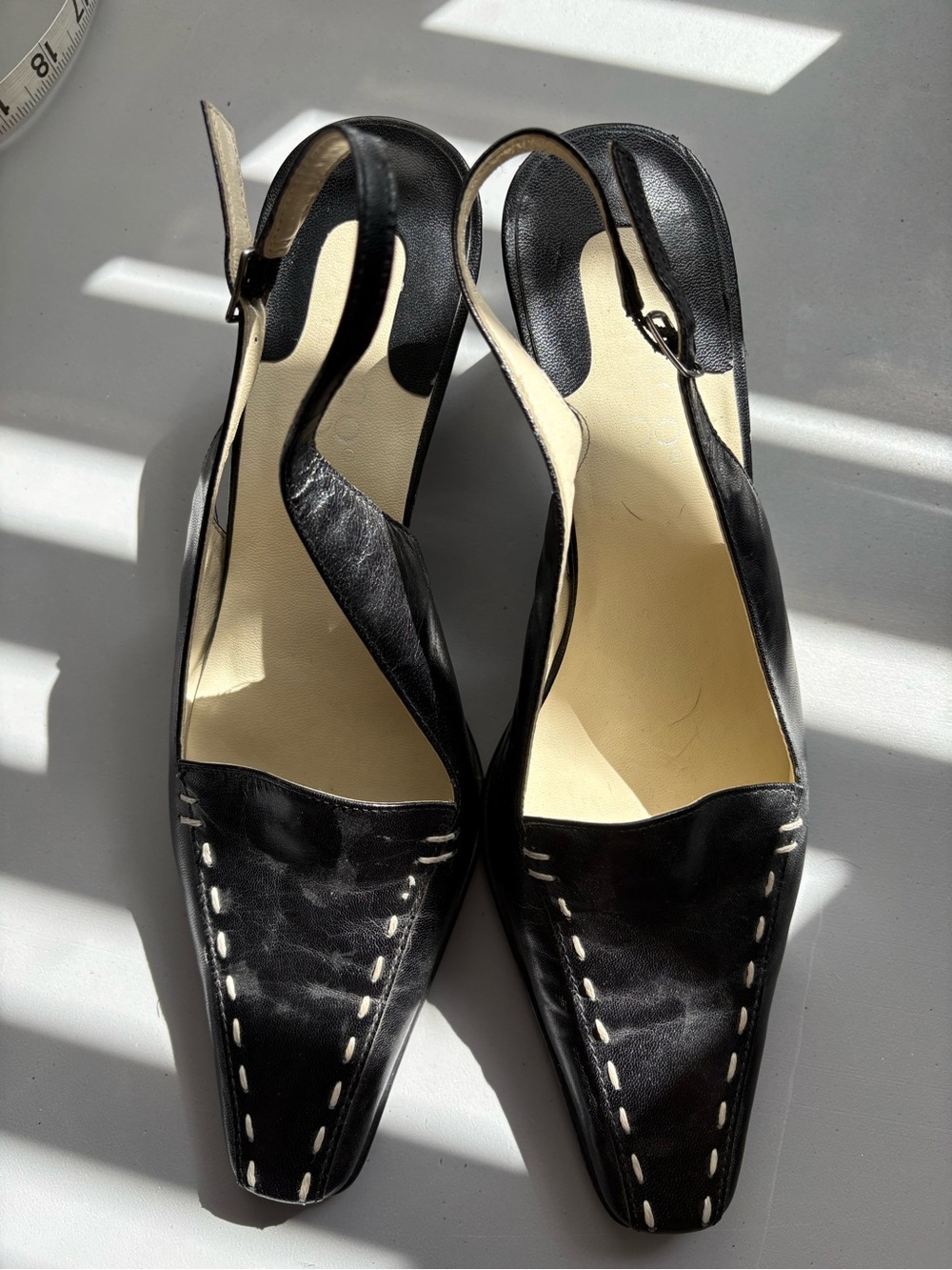 Vintage Franco Sarto black leather slingback heels.